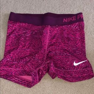 Pink cheetah print Nike pros